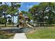 playground with a spiral slide at 1783 Lake Pl # 1783B, Venice, FL 34293