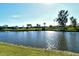 Tranquil water view of homes along canal at 1783 Lake Pl # 1783B, Venice, FL 34293