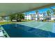 Community shuffleboard court under covered patio at 1853 Restful Dr # L2, Bradenton, FL 34207