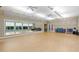 Bright and spacious fitness room with mirrors and equipment at 19256 Jalisca St, Venice, FL 34293