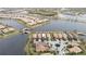 Wide shot of houses and waterways in a residential community at 19261 Isadora St, Venice, FL 34293