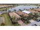 Community overview showcasing lakefront properties and lush landscaping at 19261 Isadora St, Venice, FL 34293