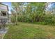 Landscaped backyard with lush greenery at 2047 Canal Dr # L6, Bradenton, FL 34207