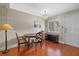 Dining area with wood table and chairs, hardwood floor at 2047 Canal Dr # L6, Bradenton, FL 34207