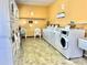 Convenient on-site laundry facility with multiple washers and dryers at 2047 Canal Dr # L6, Bradenton, FL 34207