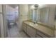 Bright bathroom with vanity, toilet and bathtub at 2599 Woodgate Ln # K7, Sarasota, FL 34231