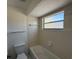 Clean bathroom with bathtub and shower at 2599 Woodgate Ln # K7, Sarasota, FL 34231