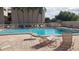 Relax and cool off in the refreshing community swimming pool at 2599 Woodgate Ln # K7, Sarasota, FL 34231