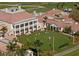 Aerial view of croquet game and clubhouse at 32 Bayhead Ln, Osprey, FL 34229