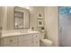 Stylish bathroom with single vanity, walk-in shower, and mirror at 32 Bayhead Ln, Osprey, FL 34229