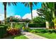 Landscaped walkway leading through community at 32 Bayhead Ln, Osprey, FL 34229