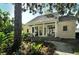 Charming guest house with porch and lush garden at 32 Bayhead Ln, Osprey, FL 34229