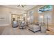 Open living room showcasing a kitchen and comfortable seating at 32 Bayhead Ln, Osprey, FL 34229