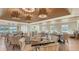 Elegant restaurant with wood floors, stylish chairs, and large windows at 32 Bayhead Ln, Osprey, FL 34229