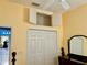 Bedroom with double door closet and attic access at 3312 92Nd E Ave, Parrish, FL 34219