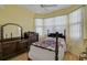 Guest bedroom with bay window and hardwood floors at 3312 92Nd E Ave, Parrish, FL 34219