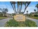 Timberly community entrance with lush landscaping at 3312 92Nd E Ave, Parrish, FL 34219