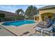 Refreshing community pool with ample lounge chairs at 3312 92Nd E Ave, Parrish, FL 34219