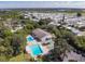 Aerial view of community with pools, clubhouse, and shuffleboard at 3333 26Th E Ave # 1219, Bradenton, FL 34208