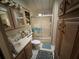 Clean bathroom with a shower/tub combo and light wood cabinets at 3333 26Th E Ave # 1219, Bradenton, FL 34208