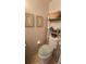 Clean bathroom with toilet and shelving at 3333 26Th E Ave # 1219, Bradenton, FL 34208