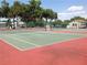 Two well-maintained tennis courts at 3333 26Th E Ave # 1219, Bradenton, FL 34208