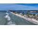 Aerial view of beachfront home with private beach access and stunning ocean views at 3625 Casey Key Rd, Nokomis, FL 34275