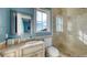 Small bathroom with shower, toilet and single vanity at 3625 Casey Key Rd, Nokomis, FL 34275