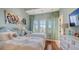 Light and airy bedroom with two twin beds and ocean view at 3625 Casey Key Rd, Nokomis, FL 34275