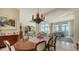 Elegant dining room features a large table and ocean views at 3625 Casey Key Rd, Nokomis, FL 34275