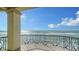 Stunning ocean view from private balcony with ornate railing at 3625 Casey Key Rd, Nokomis, FL 34275