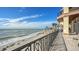 Balcony with panoramic ocean views and beach access at 3625 Casey Key Rd, Nokomis, FL 34275