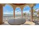 Spacious balcony with ocean views and ornate railing at 3625 Casey Key Rd, Nokomis, FL 34275