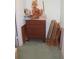 Small bedroom with dresser and various items at 3682 Lake Bayshore Dr # K402, Bradenton, FL 34205