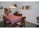 Dining room with wooden table and chairs at 3682 Lake Bayshore Dr # K402, Bradenton, FL 34205