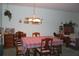 Dining room with wooden table and chairs at 3682 Lake Bayshore Dr # K402, Bradenton, FL 34205