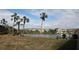 Relaxing lakefront view with picnic tables at 3682 Lake Bayshore Dr # K402, Bradenton, FL 34205