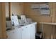 Clean laundry room with several washing and drying machines at 3682 Lake Bayshore Dr # K402, Bradenton, FL 34205