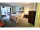 Main bedroom with a queen-size bed and plenty of closet space at 3682 Lake Bayshore Dr # K402, Bradenton, FL 34205