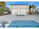 Outdoor community basketball court with blue and gray surface at 4001 Beneva Rd # 208, Sarasota, FL 34233