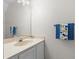 Clean bathroom with updated vanity and mirror at 4001 Beneva Rd # 208, Sarasota, FL 34233