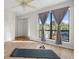 Spacious bedroom with mirrored closet and large windows at 4001 Beneva Rd # 208, Sarasota, FL 34233