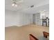 Living room with kitchen and stairs to upper level at 4001 Beneva Rd # 208, Sarasota, FL 34233