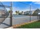 Tennis court with chain link fence at 4001 Beneva Rd # 208, Sarasota, FL 34233