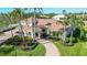 Luxury home showcasing a large backyard and landscaping at 4201 Palacio Dr, Sarasota, FL 34238