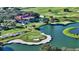 Aerial view of golf course and clubhouse at 4201 Palacio Dr, Sarasota, FL 34238