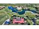 Aerial view showing community, golf course, and clubhouse at 4201 Palacio Dr, Sarasota, FL 34238