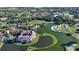 Aerial view of community buildings and golf course at 4201 Palacio Dr, Sarasota, FL 34238