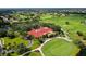 Aerial view of upscale community, golf course, and clubhouse at 4201 Palacio Dr, Sarasota, FL 34238