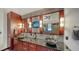 Elegant bathroom with double sinks, modern fixtures, and a large mirror at 4201 Palacio Dr, Sarasota, FL 34238